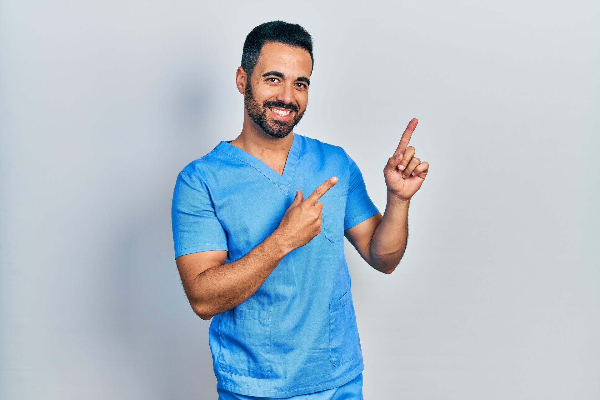 Male caregiver in uniform ready to provide care